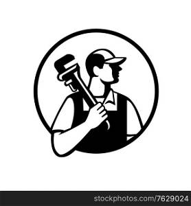 Black and white illustration of a plumber holding pipe wrench on shoulder looking to the side viewed from front set inside circle on isolated background done in retro style. . Plumber Holding Pipe Wrench Looking to Side Circle Retro Black and White