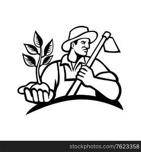 Black and white illustration of an organic farmer wearing a hat holding a plant by the palm of his hand with grab hoe on his shoulder looking to side on isolated background in retro style.. Organic Farmer Holding Plant and Grab Hoe Mascot Black and White