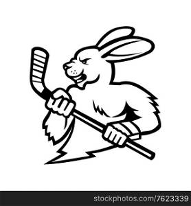 Black and white illustration of head of a hare, jackrabbit or rabbit ice hockey player holding an ice hockey stick viewed from side on isolated background in retro style.. Jackrabbit With Ice Hockey Stick Mascot Black and White