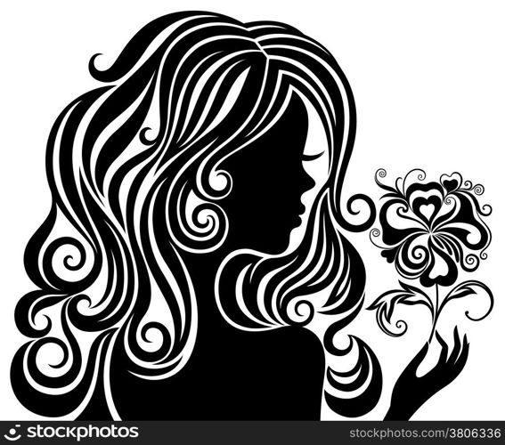 Black and white silhouette of a girl with luxurious hair and flower