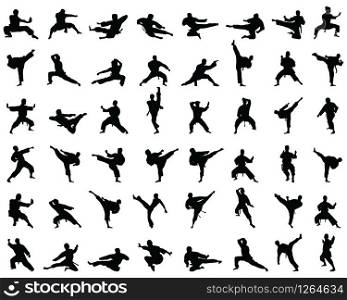 Black karate silhouettes on the white background