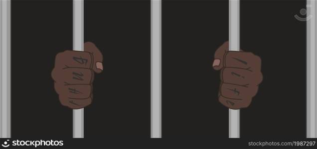Black male hands with Thug Life tattoo holding prison bars. Black man fists holding prison bars