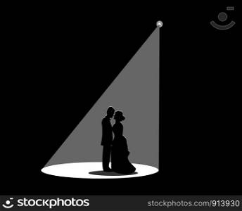 Black silhouette of a married couple The white spotlight is splashed down.