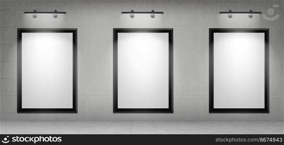 Blank movie posters illuminated by spotlights. Vector realistic mockup of white picture in black frames on gray tiled wall in cinema, theater hallway or gallery. Empty advertising banners with l&s. Blank movie posters with frames and spotlights