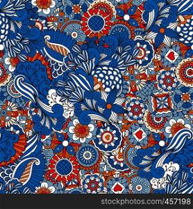 Blue red and orange vintage design floral pattern made from geometric flowers and kaleidoscope forms. Blue red and orange vintage floral pattern