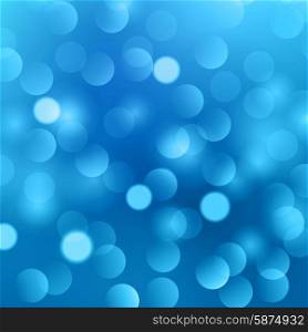 Blurred abstract background . Blurred abstract background with blue and white bokeh