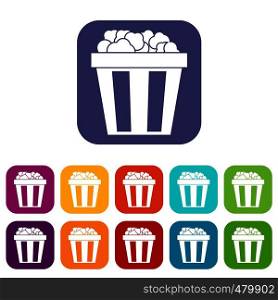 Box of popcorn icons set vector illustration in flat style in colors red, blue, green, and other. Box of popcorn icons set
