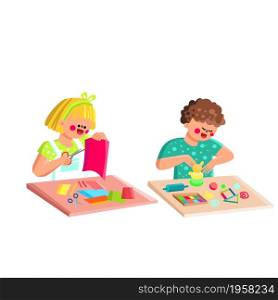 Boy And Girl Kids Crafting In Classroom Vector. Preteen Schoolboy And Schoolgirl Children Crafting Together With Paper And Plasticine. Characters Educational Creativity Time Flat Cartoon Illustration. Boy And Girl Kids Crafting In Classroom Vector
