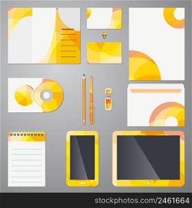 Brand identity mockup template on stationery mobile devices and office suppies wit a colorful yelow and orange modern circular pattern