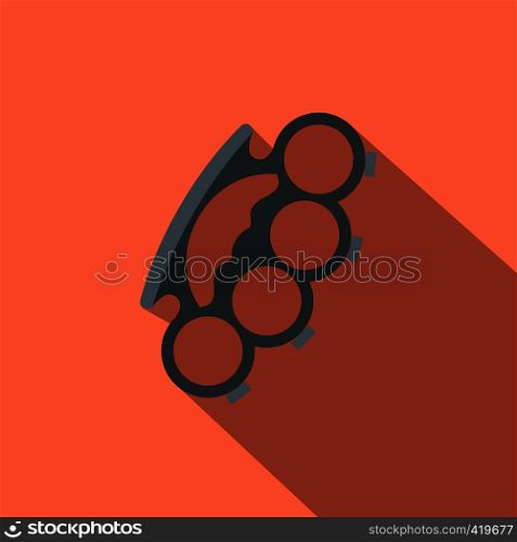 Brass knuckles flat icon on a russet background. Brass knuckles flat