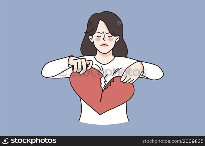 Breaking up and Broken heart concept. Young sad unhappy disappointed crying woman standing and breaking huge red heart into pieces vector illustration . Breaking up and Broken heart concept