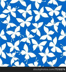 Bright seamless pattern with white silhouettes of flying butterflies randomly scattered over cyan background. Textile, wallpaper or nature theme design usage. Seamless white flying butterflies pattern