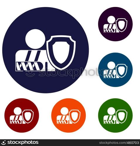 Broken arm and safety shield icons set in flat circle reb, blue and green color for web. oken arm and safety shield icons set