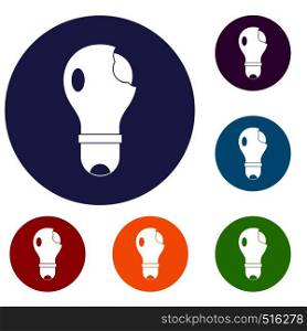 Broken lightbulb icons set in flat circle red, blue and green color for web. Broken lightbulb icons set