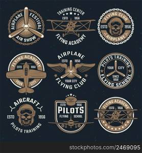 Brown airplane emblem set isolated on black background with different shapes on flying academy theme vector illustration. Brown Airplane Emblem Set