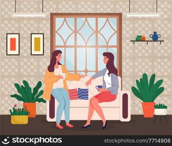 Brunette women sitting at sofa and talking. Friends relaxing at home with a cup of tea or coffee. Happy spending leisure time at home. Sisters talking, relaxing at couch near window in living room. Two young girls sitting at sofa in living room near window and talking with a cup of tea or coffee