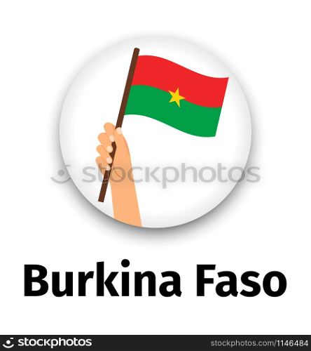 Burkina Faso flag in hand, round icon with shadow isolated on white. Human hand holding flag, vector illustration. Burkina Faso flag in hand round icon