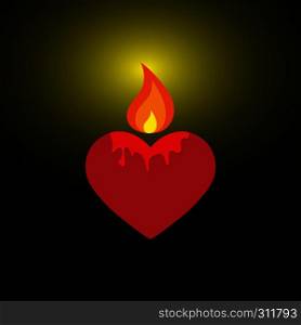Burning candle in the form of a heart illuminates the surrounding space