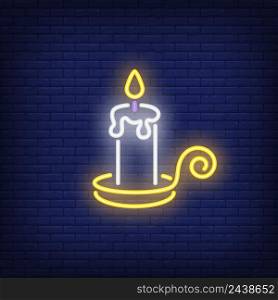Burning candle neon sign. Luminous signboard with candlelight. Night bright advertisement. Vector illustration in neon style for Halloween, religion, light