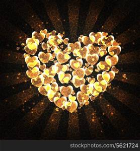 burning heart with sparkles on a dark background