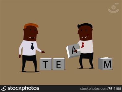 Business partnership, team building work or cooperation business concept. Creative businessmen with alphabet cubes are composing a word Team. Two businessmen composing word Team from cubes