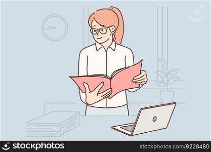 Business woman with folder of documents stands in office near table with laptop checking reports prepared by company employees. Business lady is at workplace doing work of accountant or auditor . Business woman with documents stands in office near table with laptop checking reports employees