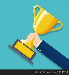Businessman hand holding Gold Trophy Cup. Winner trophy award. First place. Gold Trophy Cup. Winner business goal achievement. Vector illustration in flat style. Businessman hand holding Gold Trophy Cup.
