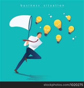 businessman holding a butterfly net try to catch light bulb. idea concept