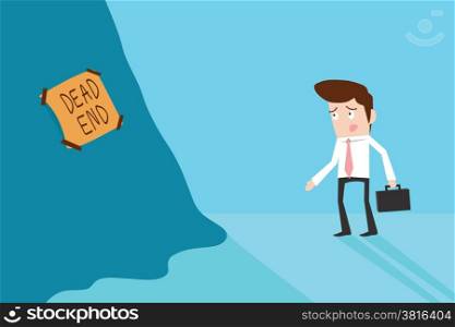 Businessman standing in front of dead end