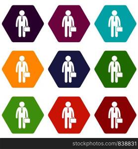 Businessman standing with his briefcase icon set many color hexahedron isolated on white vector illustration. Businessman standing with his briefcase icon set color hexahedron