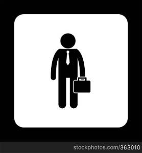 Businessman with briefcase icon in simple style on a white background. Businessman with briefcase icon, simple style