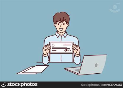 Businessman with paycheck sits at office desk with laptop showing off investments in start-ups from large corporations. Man with paycheck at his workplace demonstrates certificate for large amount. Businessman with paycheck sits at office desk with laptop showing off investments in start-ups