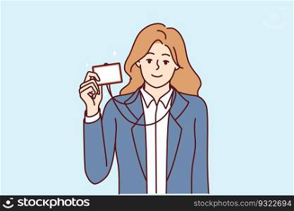 Businesswoman demonstrating ID badge to gain access to room or to introduce herself when meeting colleague. Girl manager in business clothes shows ID badge giving right enter office.. Businesswoman with ID badge to gain access to room or to introduce herself when meeting colleague