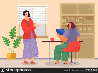 Businesswomen dressed in casual clothes sitting at the table with computer, standing in room and talking. Office meeting and consideration of working affairs. Office workers women in workspace. Businesswomen dressed in casual clothes sitting at the table with computer and talking in workspase