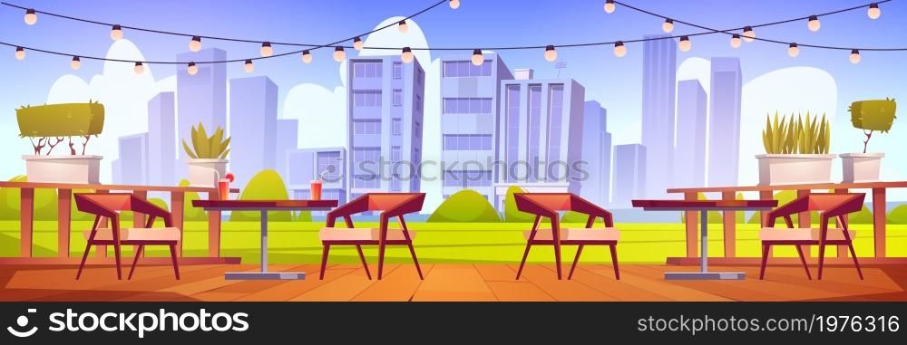 Cafe terrace with wooden tables, chairs, green lawn and city view. Vector cartoon illustration of empty patio of restaurant with drinks on table, plants and garland with light bulbs. Cafe terrace with tables, chairs and green lawn