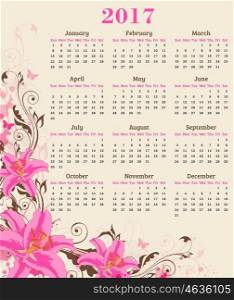 Calendar for 2017 year. Abstract floral background with pink lily flowers and leaves.