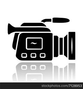 Camera drop shadow black glyph icon. Camcorder. Videotaping, video recording. Filmmaking professional equipment. Video production, cinematography industry. Isolated vector illustration
