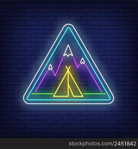 Camp in mountains neon sign. Triangle, tent, peaks, snowcap, wigwam. Vector illustration in neon style for light banners and billboards, trekking, adventure travel