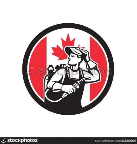 Canadian Welder Canada Flag Icon. Icon retro style illustration of a Canadian welder or lit operator with visor holding welding torch with Canada maple leaf flag set inside circle on isolated background.. Canadian Welder Canada Flag Icon