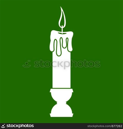 Candle icon white isolated on green background. Vector illustration. Candle icon green