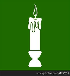 Candle icon white isolated on green background. Vector illustration. Candle icon green