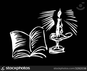 candle with book on black background