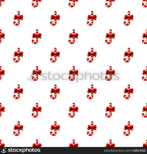 Candy cane with bow pattern seamless repeat in cartoon style vector illustration. Candy cane with bow pattern