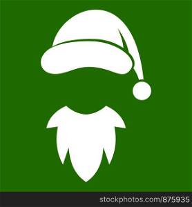 Cap with pompon of Santa Claus and beard icon white isolated on green background. Vector illustration. Cap with pompon of Santa Claus and beard icon green