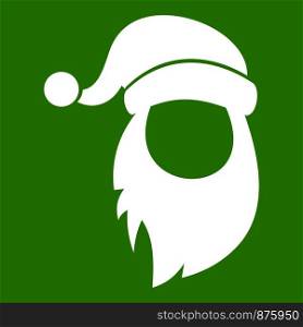 Cap with pompon of Santa Claus and beard icon white isolated on green background. Vector illustration. Cap with pompon of Santa Claus and beard icon green