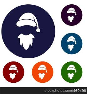 Cap with pompon of Santa Claus and beard icons set in flat circle reb, blue and green color for web. Cap with pompon of Santa Claus and beard icons set