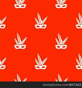 Carnival mask pattern repeat seamless in orange color for any design. Vector geometric illustration. Carnival mask pattern seamless