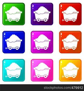 Cart on wheels with coal icons of 9 color set isolated vector illustration. Cart on wheels with coal set 9