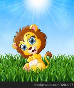 Cartoon baby lion sitting in the grass on a background of bright sunshine