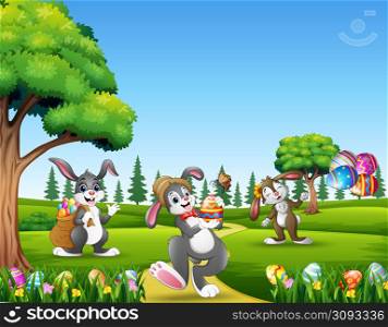 Cartoon bunnies holding decorated eggs on easter background